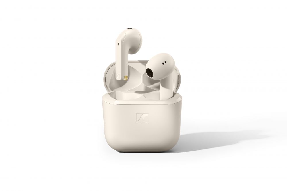 A white wireless earbuds in a white caseDescription automatically generated